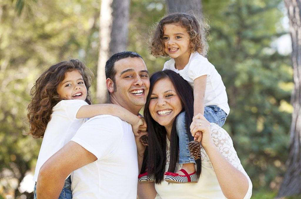 Happy family at Coit Dental, a Cigna in-network dentist in Frisco, TX
