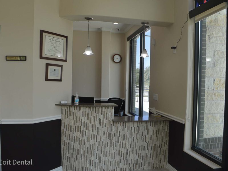Welcoming reception area at Coit Dental in Frisco, TX — bright, modern dental office front desk